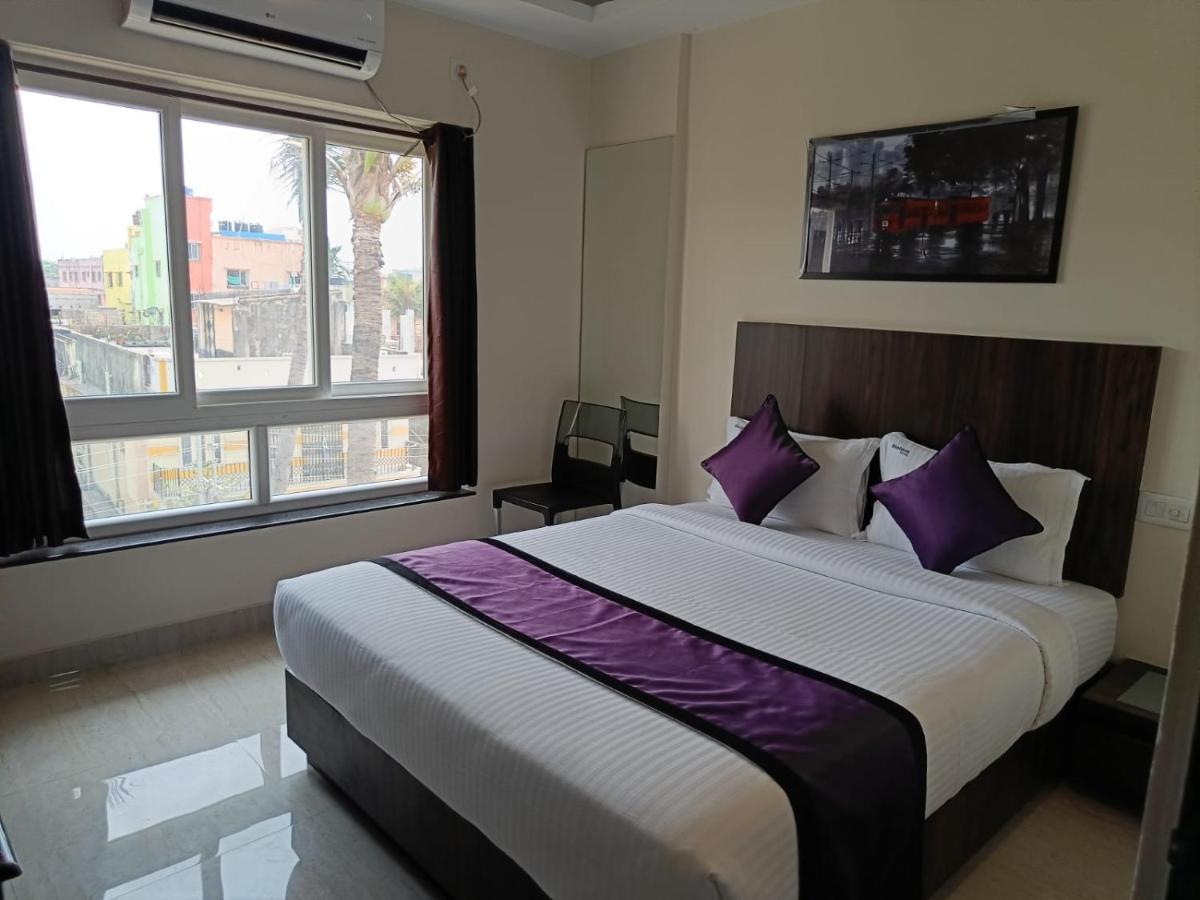Sheldon Inn Calcutta Buitenkant foto