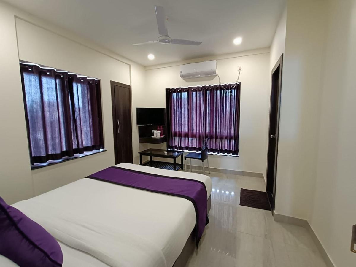 Sheldon Inn Calcutta Buitenkant foto
