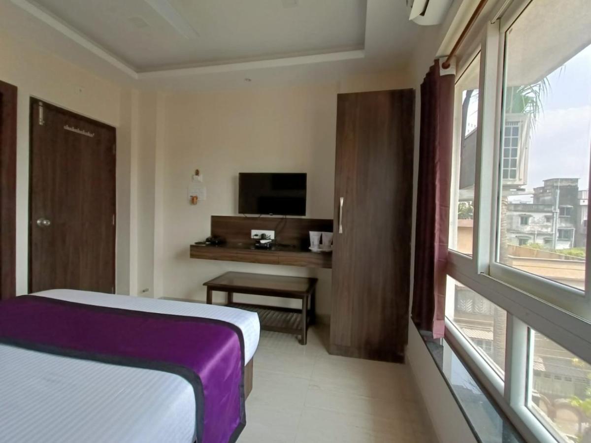 Sheldon Inn Calcutta Buitenkant foto